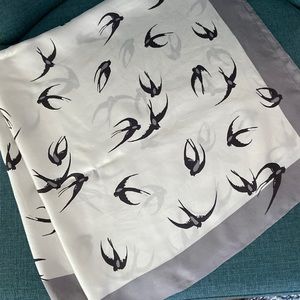 Gorgeous silk-like scarf. 34” square. Bird motif.